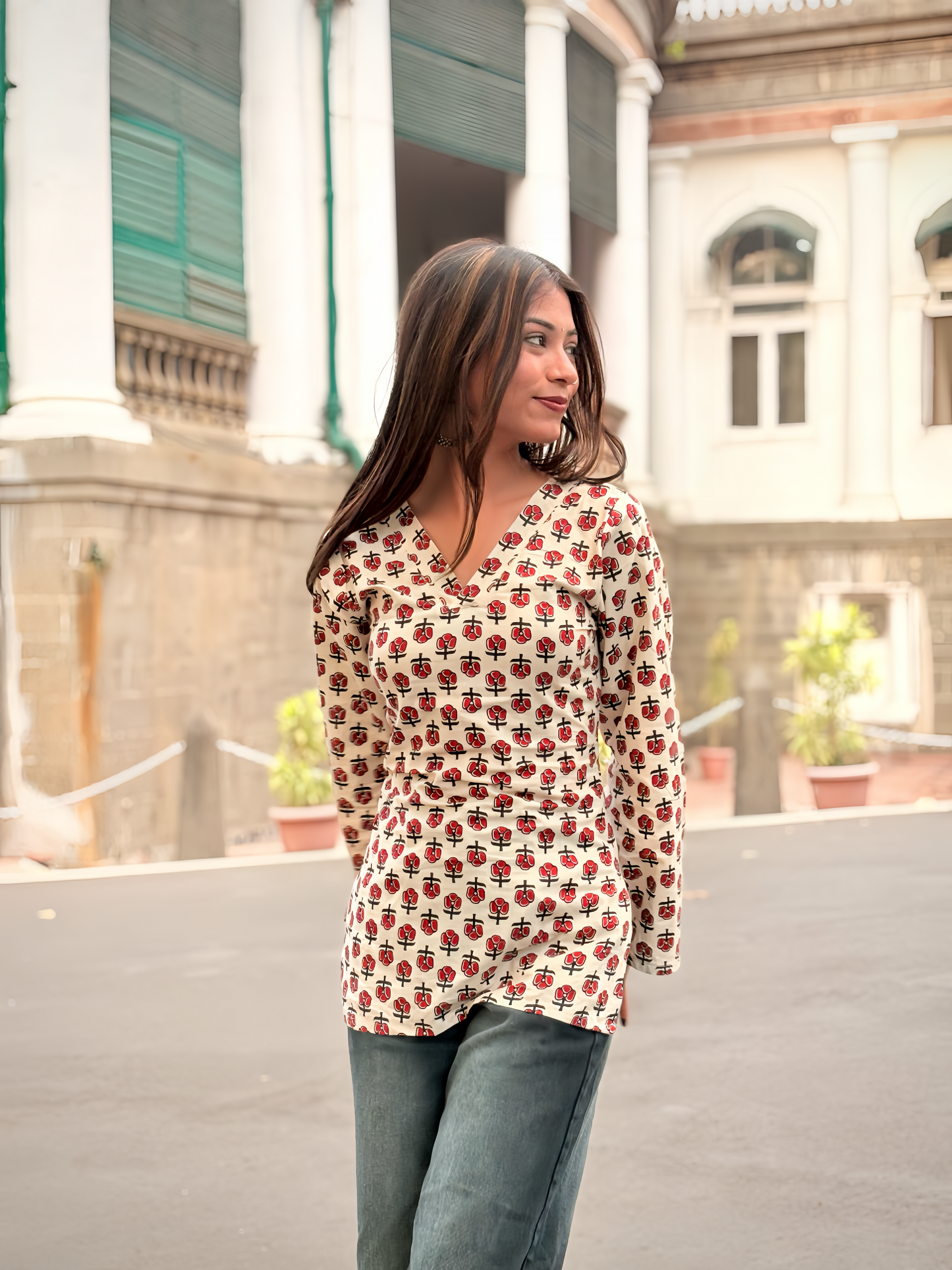 Girl wearing ivory red floral block-print top