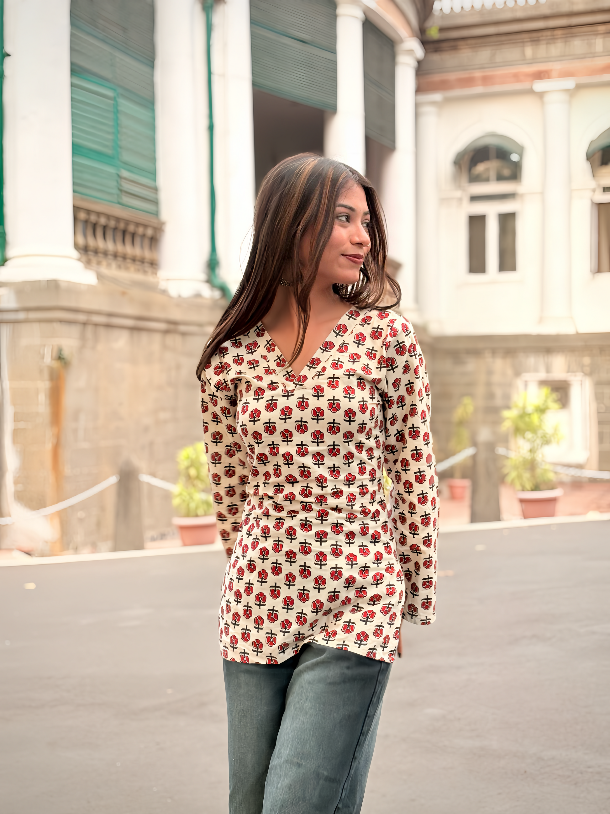 Girl wearing ivory red floral block-print top